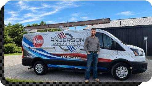 Jake Anderson standing in from of his Anderson Heating & Cooling van