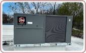 Large commercial HVAC unit on the rooftop of commercial building