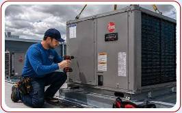 Technician installing commercial Heat Pump on rooftop of building Central Kentucky